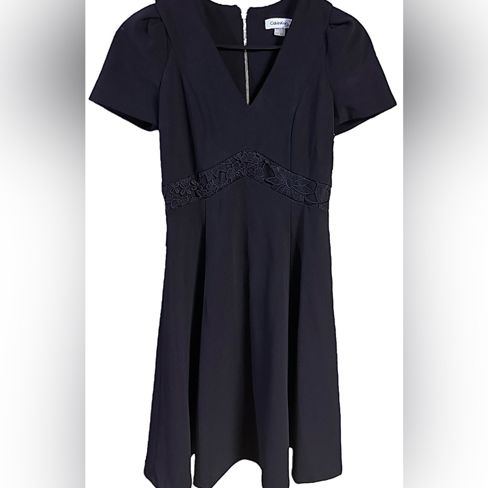 Calvin Klein Women gold zipper $139 nwt
Modern Black lace dress sz 2